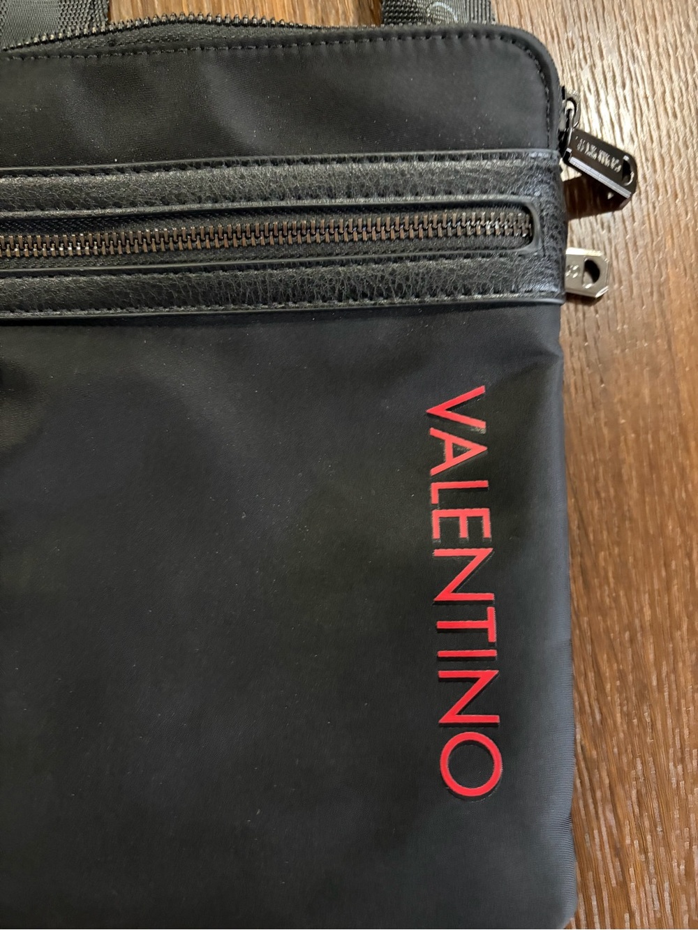 Valentino Black Messenger Bag with Red Logo